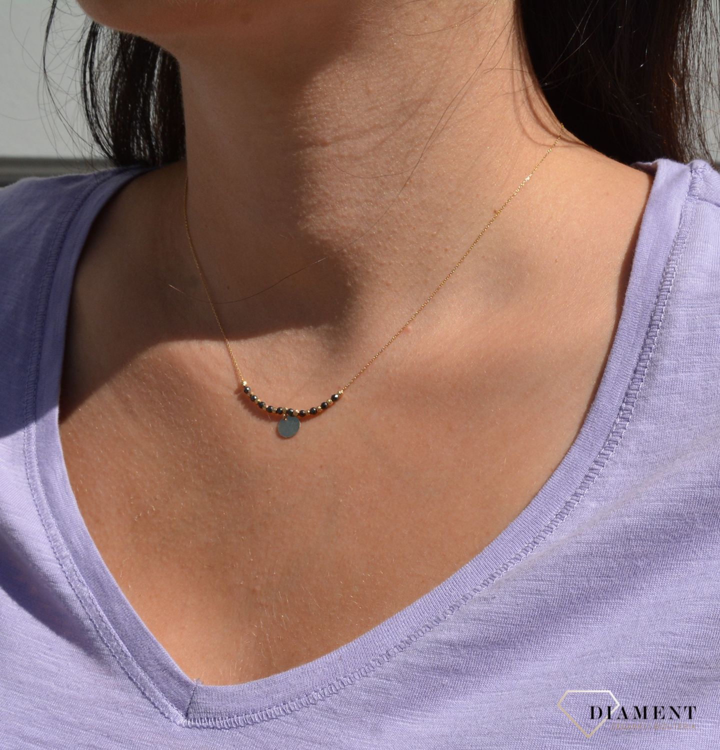 Złoty naszyjnik celebrytka z czarnymi i złotymi kuleczkami NA 2106.jpg